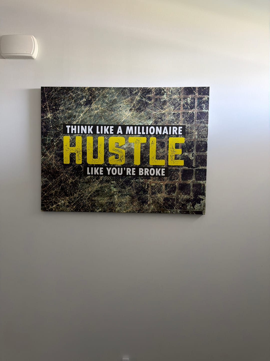 Customer photo review of Think Like A Millionaire Hustle Like You're Broke Canvas Wall Art, Motivational Decor