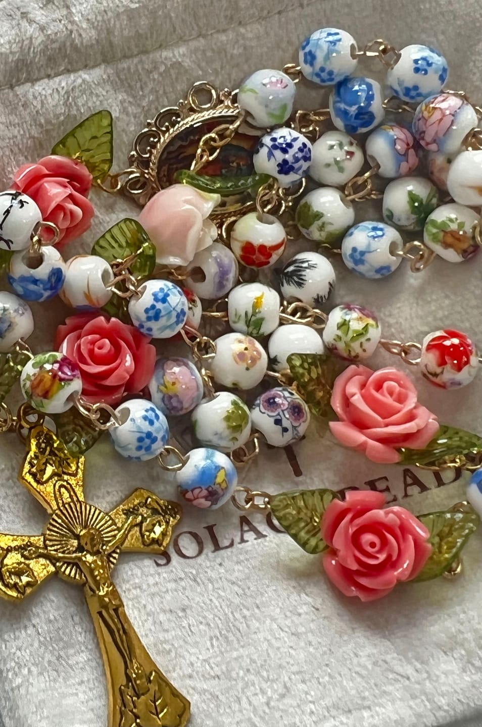 Customer photo review of SolaceBeads Vintage Mixed Floral Ceramic Rosary With Guadalupe & Crucifix: Timeless Garden