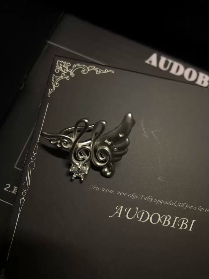 Customer photo review of Winged Grace Platinum Plating Music Note Wing Ear Cuffs™