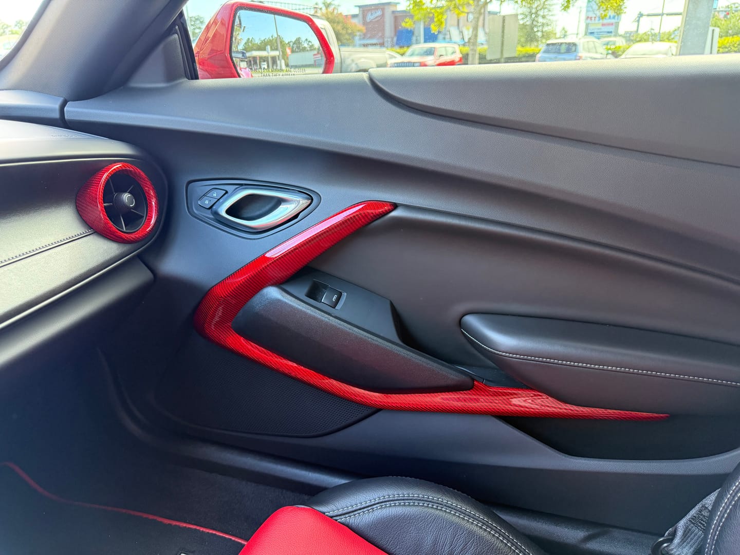 Customer photo review of 2016-2024 Camaro Real Carbon Fiber Interior Door Panel Chrome Trim Cover