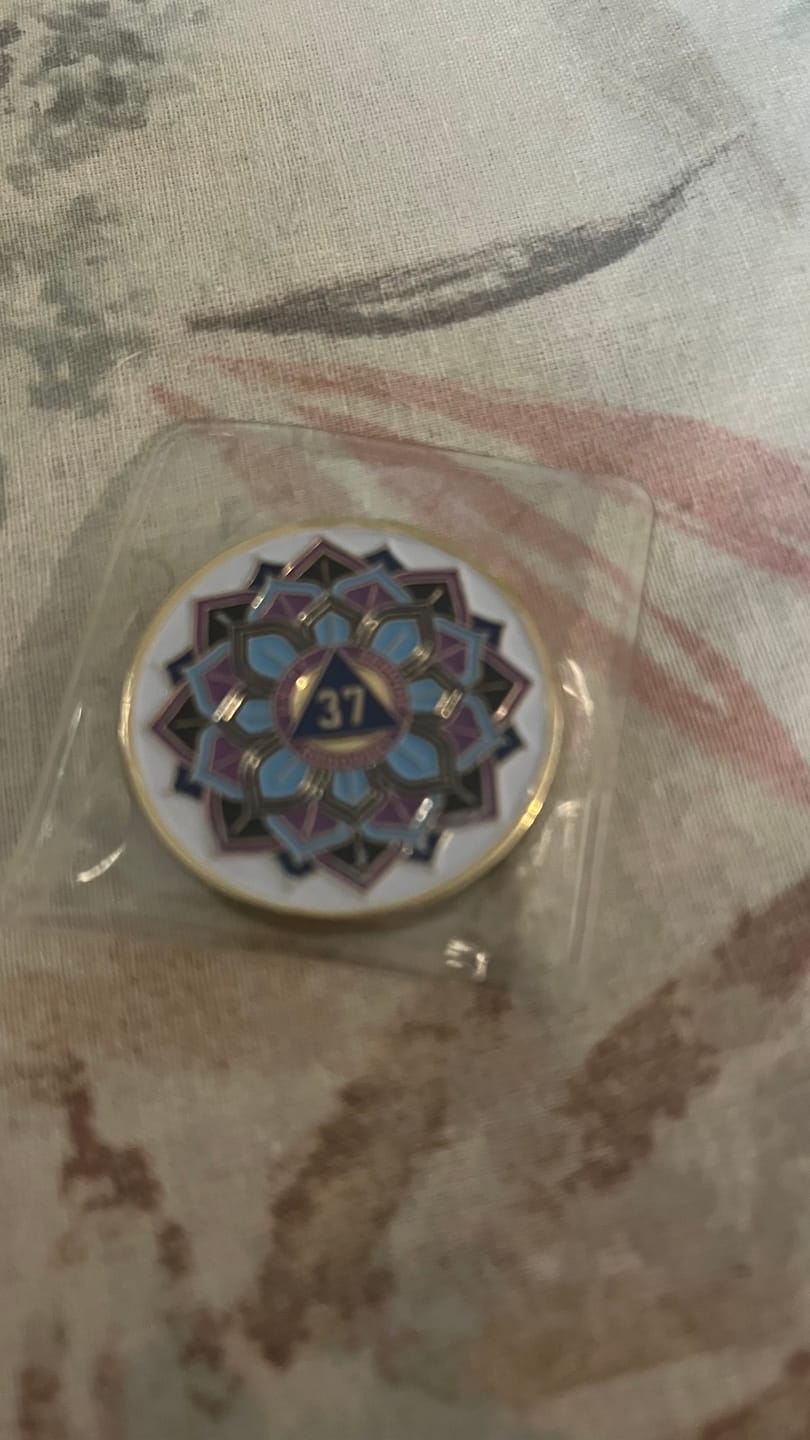 Customer photo review of 37 Year Sobriety Mint 'In Bloom' Lotus Flower Gold Plated AA Recovery Medallion - Thirty-Seven Year Chip/Coin - White