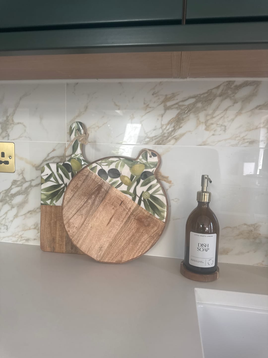Customer photo review of 500ml Amber Glass Bottle with Metal Pump White Label