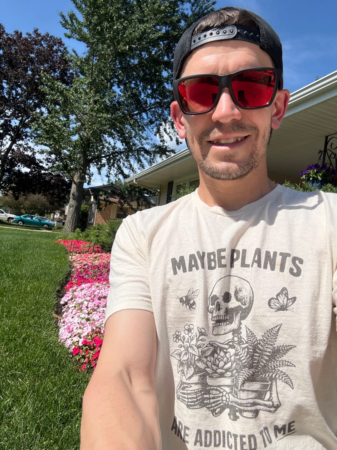 Customer photo review of Maybe Plants Are Addicted to Me Tee