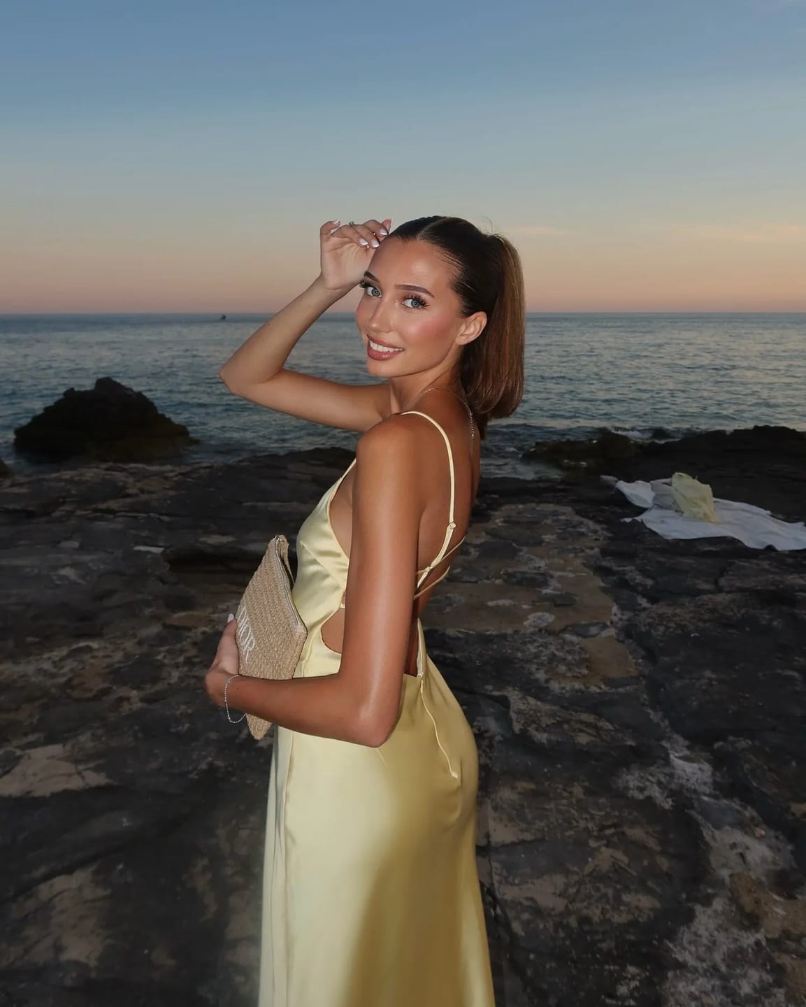 Customer photo review of Kirra Satin Backless Maxi Dress