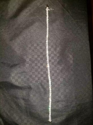 Customer photo review of 3MM VVS1 Moissanite Tennis Chain 16K Gold Plated