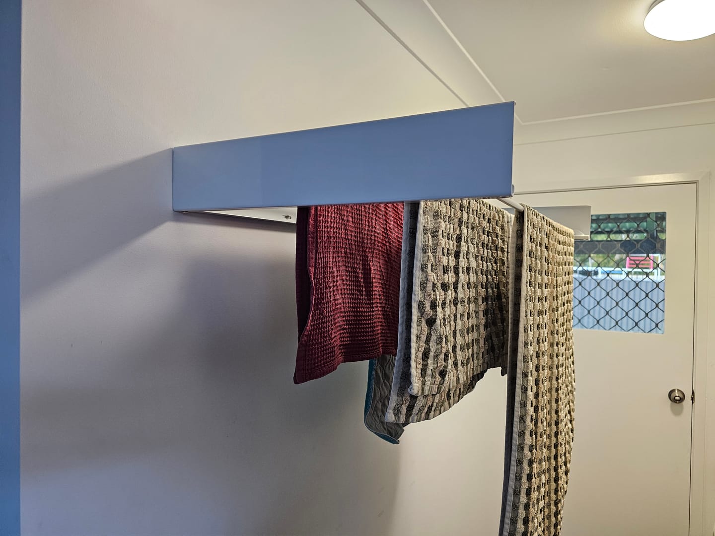 Customer photo review of Wall Mounted Drying Rack - Foldable Indoor and Outdoor Drying Rack