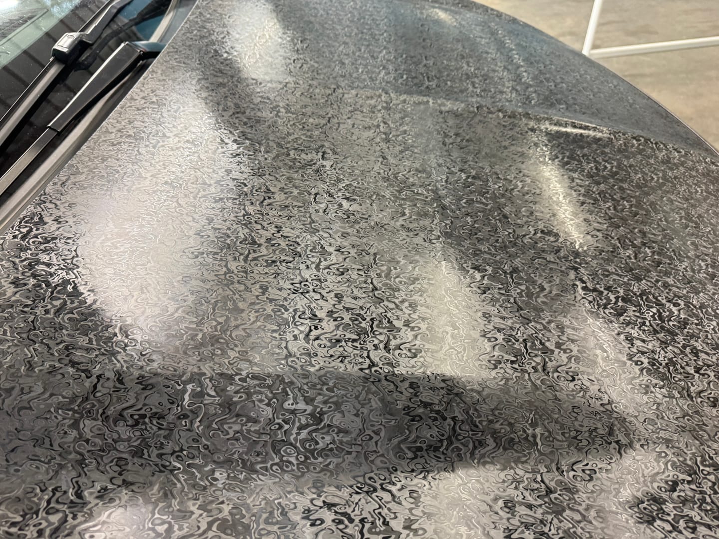 Customer photo review of Phantom Black Carbon Fiber Vinyl Wrap