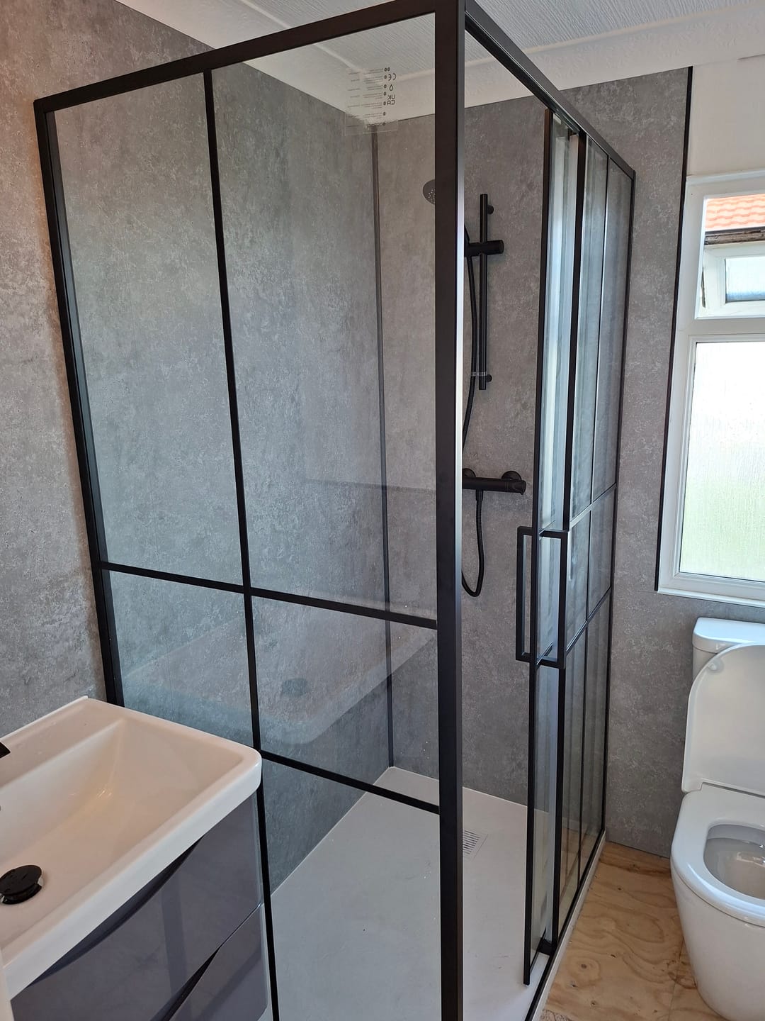 Customer photo review of Premium Grey Concrete Matt Shower Wall Panel - 1M x 2.4M