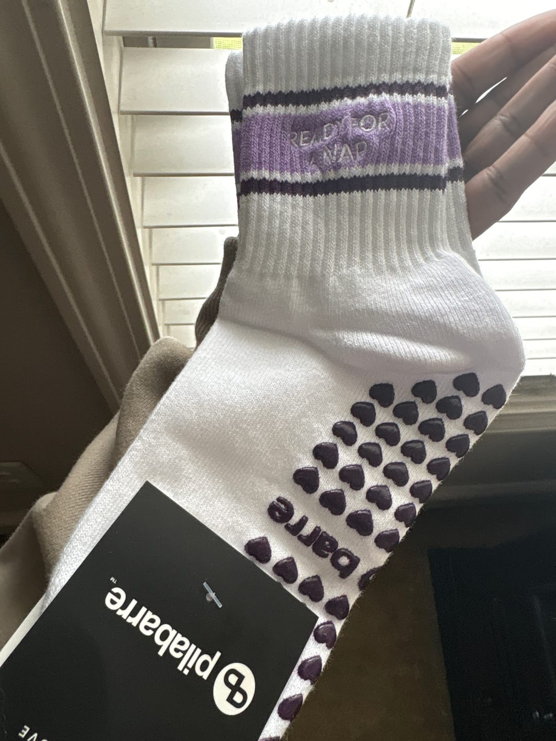 Customer photo review of Ready for a Nap Grip Socks