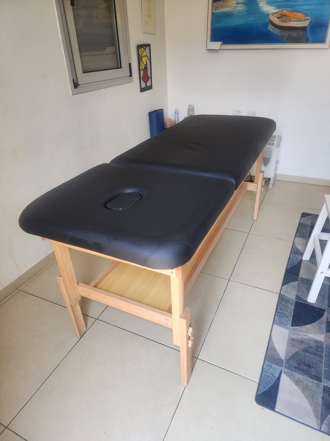 Customer photo review of מיטת טיפולים קבועה מעץ עם גב מתרומם