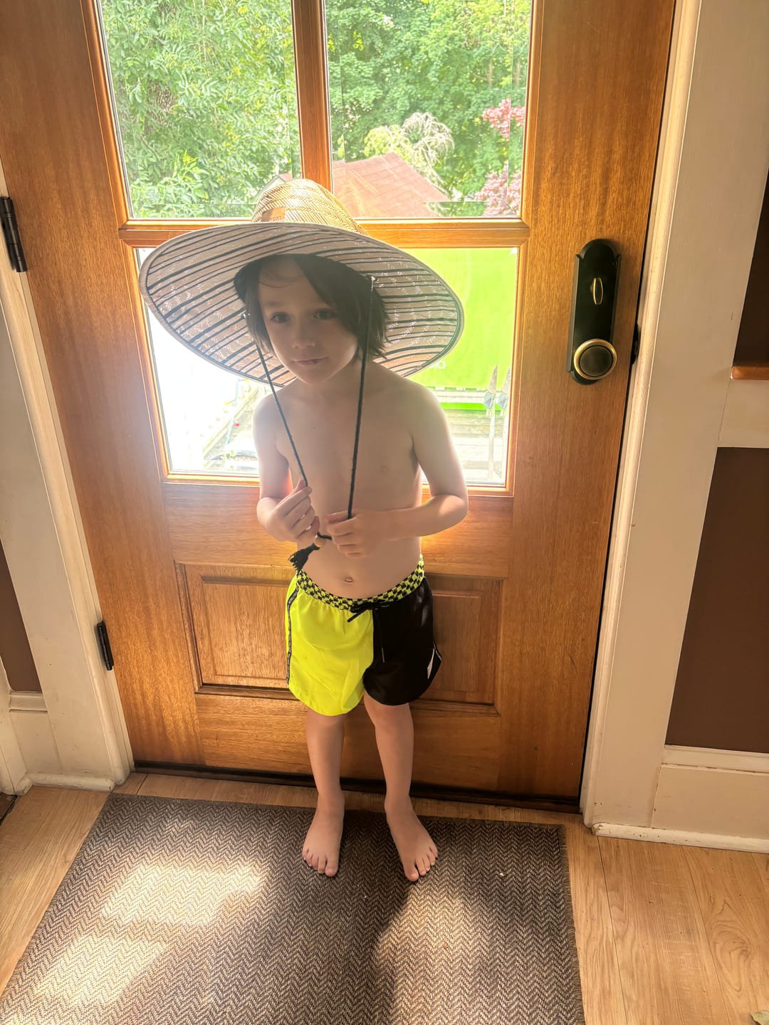 Customer photo review of Hybrid Swim Trunks in Neon Electric Lime + Black Colorblock