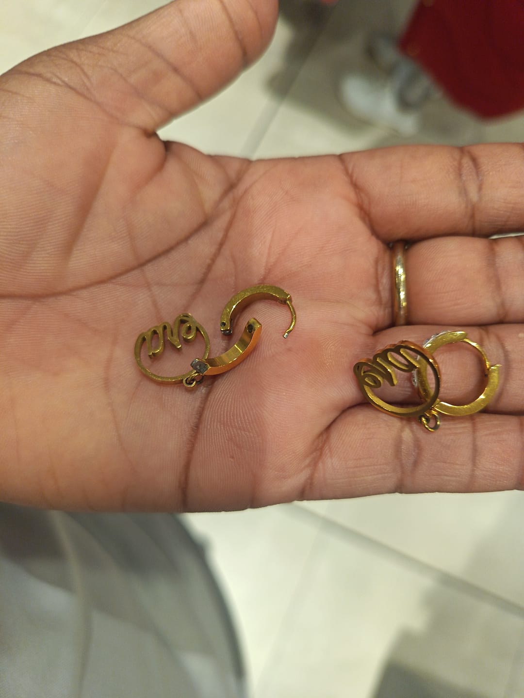 Customer photo review of Gold Precious Logo Earrings