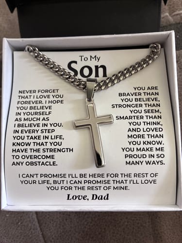 Customer's Artisan Cross on a Cuban Link Chain gift set, showing the necklace on the message card inside its box.
