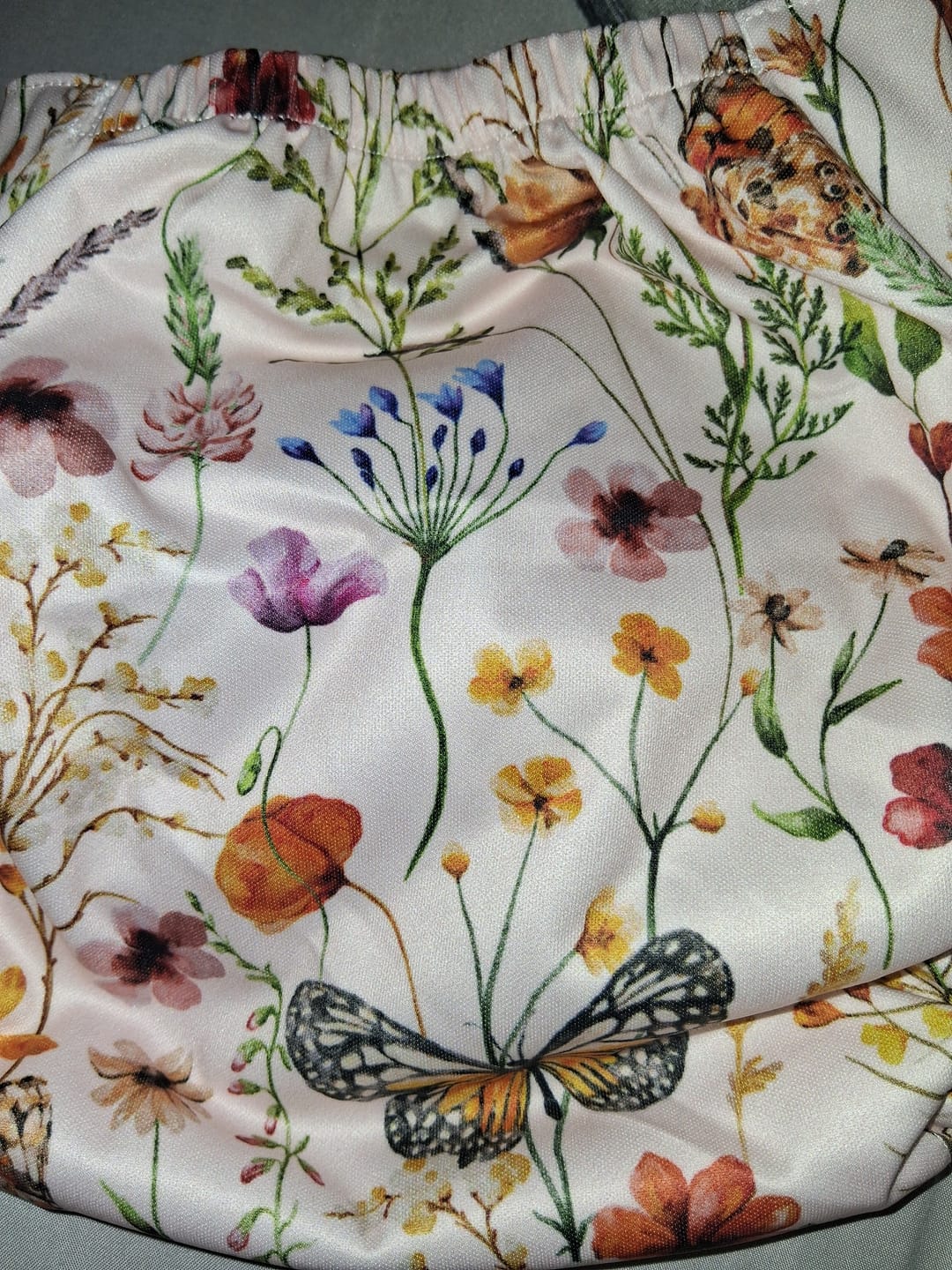 Customer photo review of Floral: Essentials Pocket Cloth Diaper with Athletic Wicking Jersey, Grows with your Baby
