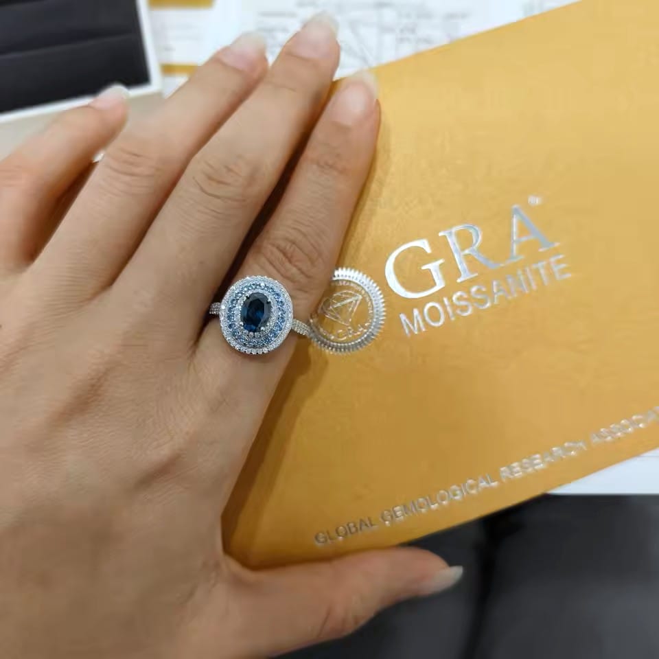 Customer photo review of Celeste Oval Blue Moissanite Double Halo Ring