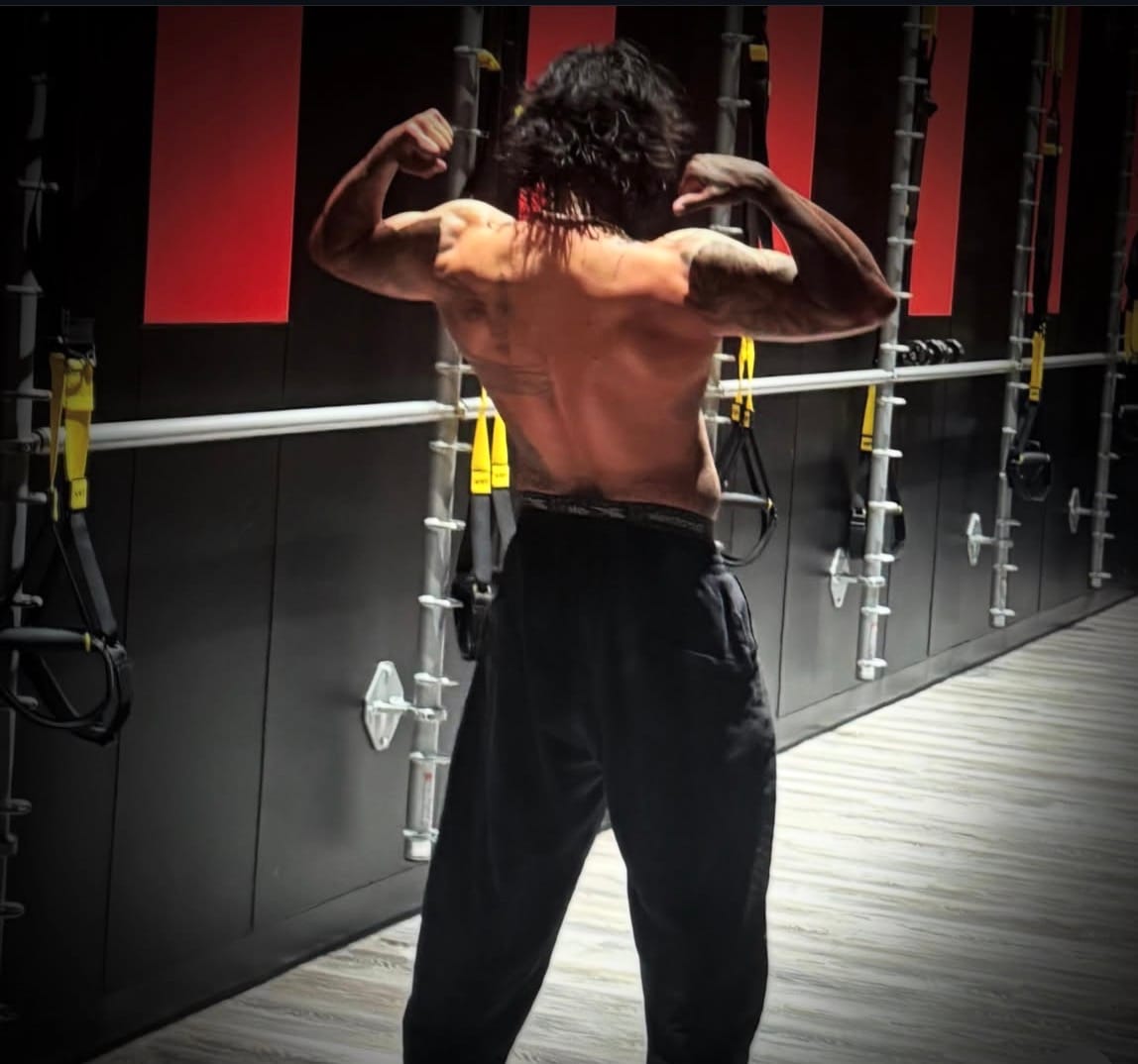 Customer photo review of 🎁 Add 2 Inches to Your Arms: The 1,000-Rep Gauntlet Workout Program (100% off)