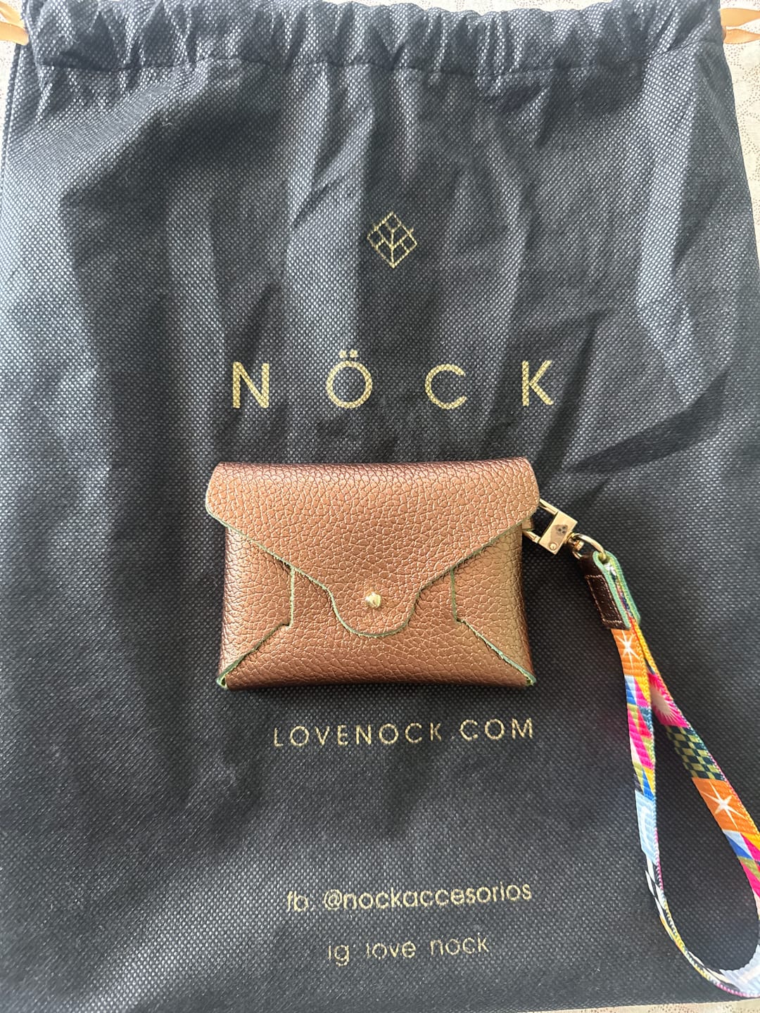 Customer photo review of Monedero Sobre con pulsera Bronce