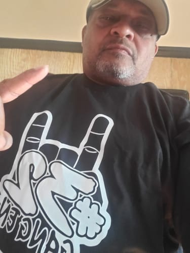 Customer photo review of 32 GANG BUDGET TEE
