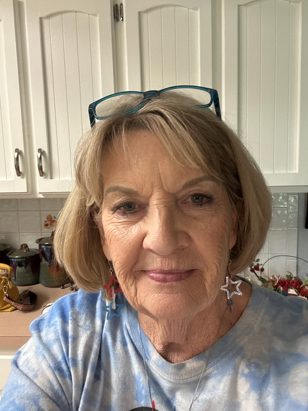 Customer photo review of Exaggerated Linked Stars Dangles Hypoallergenic Earrings for Sensitive Ears with Plastic Posts