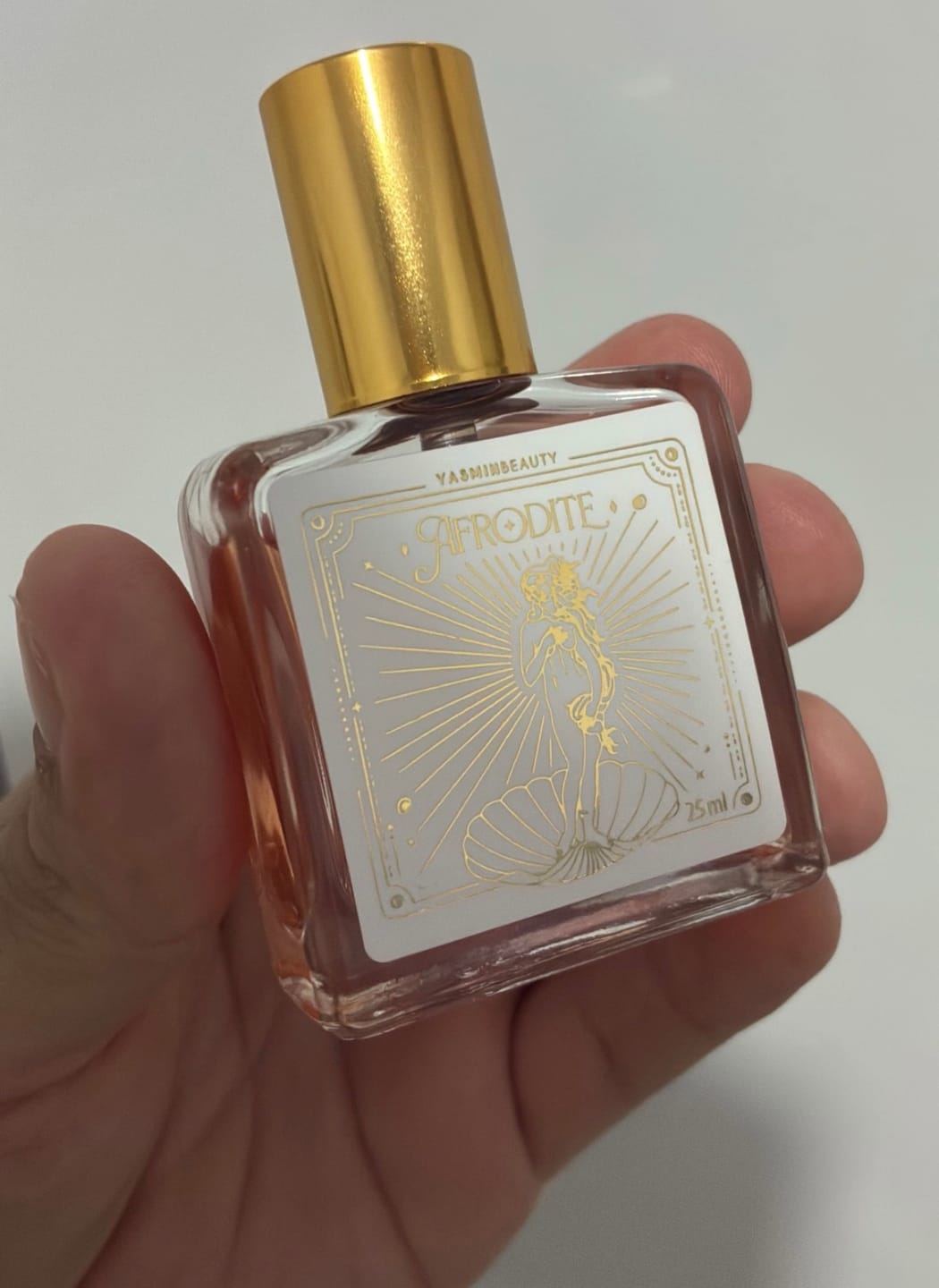 Customer photo review of Fragrância Afrodite Miniatura 25ML