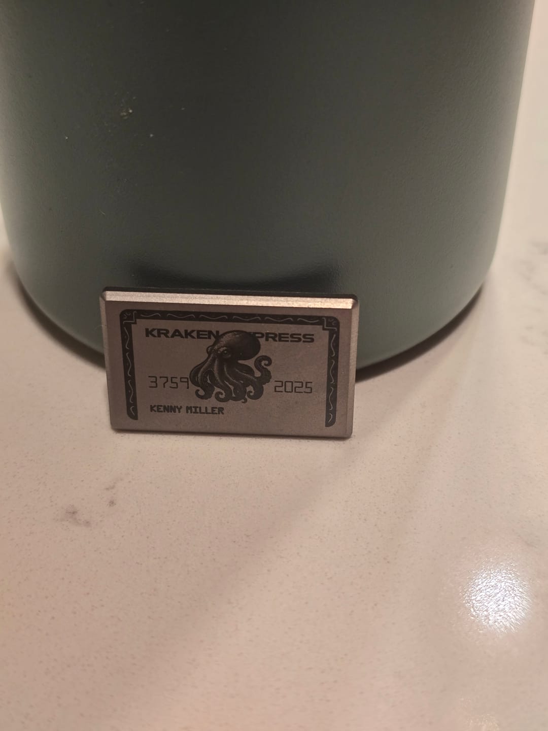 Customer photo review of The Silver Kraken Express Ball Marker | Kraken Titanium Golf Ball Marker