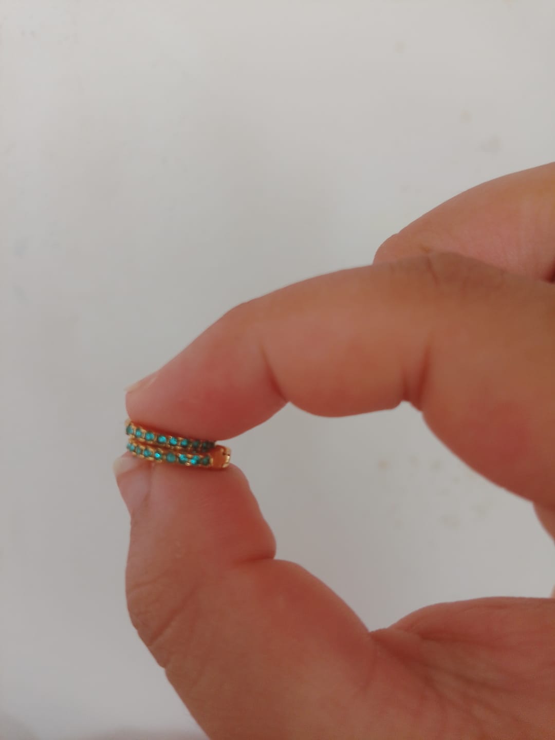 Customer photo review of Evie Turquoise Gold Huggie Earrings