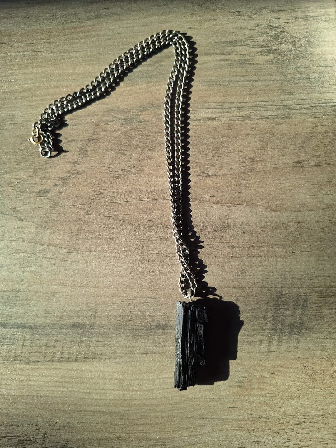 Customer photo review of Tourmaline Black Raw Pendant 2"