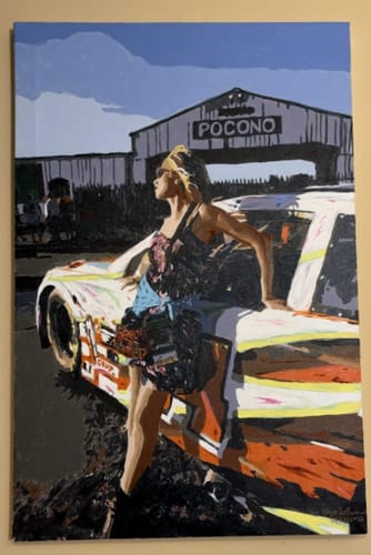Customer's completed Custom Paint By Numbers portrait of a woman leaning on a race car at Pocono raceway.