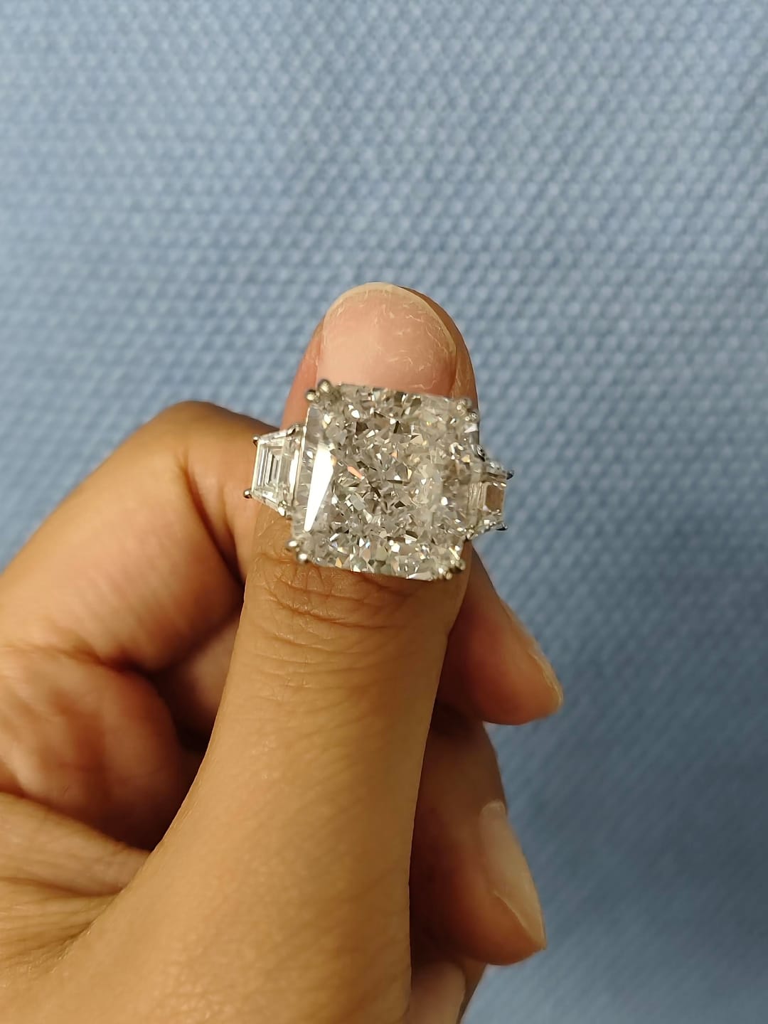 Customer photo review of S925 6.5/12.0 Ct Radiant Cut Crushed Ice Simulated Diamond Three-Stone Engagement Travel Ring