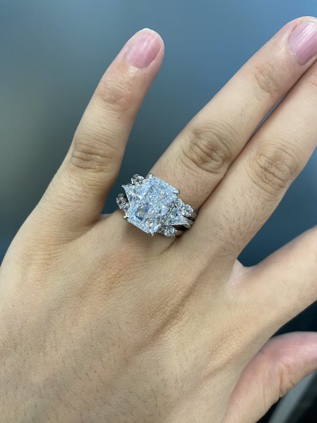 Customer photo review of S925 3PC 5.0Ct Radiant Cut Wedding Ring Set White Gold Side Stone Engagement Rings With 2PC Pavé Wedding Band