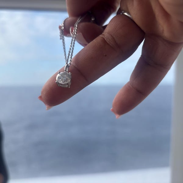 Customer photo review of Classica VVS1 Round Cut Moissanite Solitaire Necklace