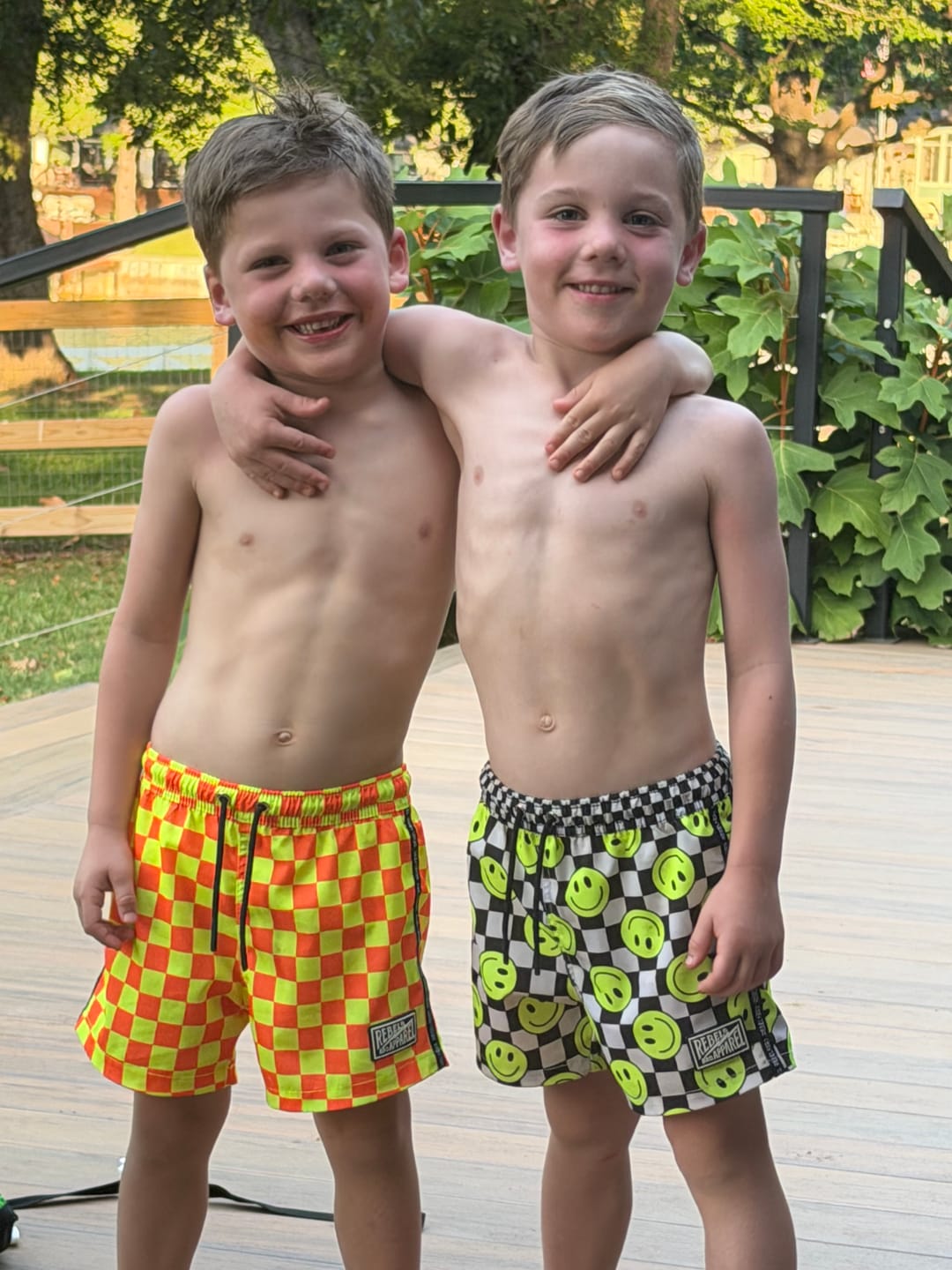 Customer photo review of Hybrid Swim Trunks in Neon Electric Lime Smileys