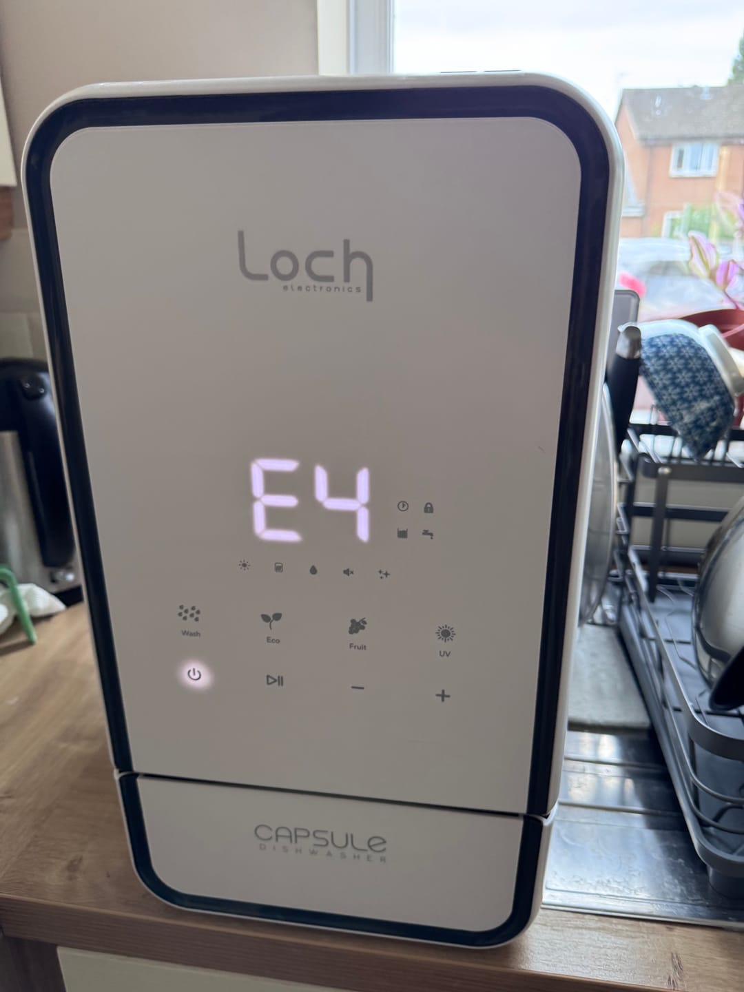 Customer photo review of Capsule Dishwasher