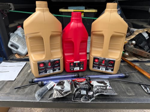 Customer shows the well-packaged fuel jugs and accessories that were delivered safely using the shipping protection.