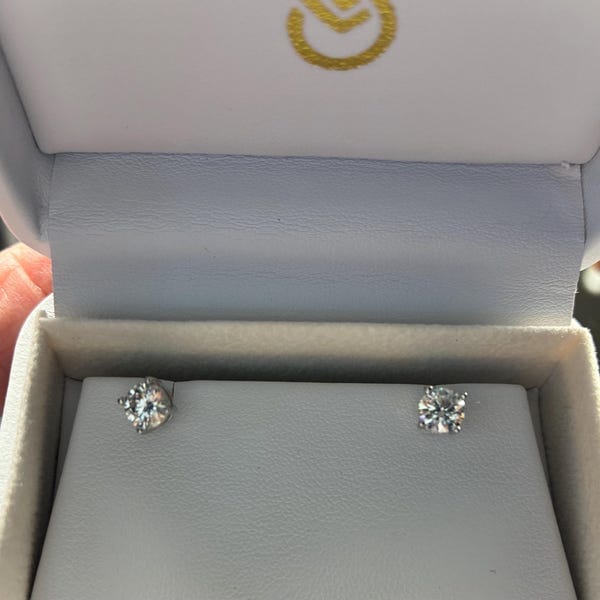 Customer photo review of Classica VVS1 Round Moissanite Solitaire Stud Earrings