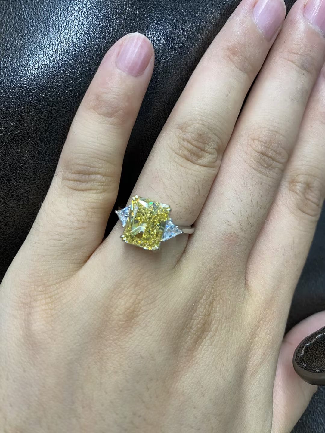 Customer photo review of S925 4.0Ct Radiant & Triangle Cut Yellow Stone Three Stone Engagement Ring In Sterling Silver