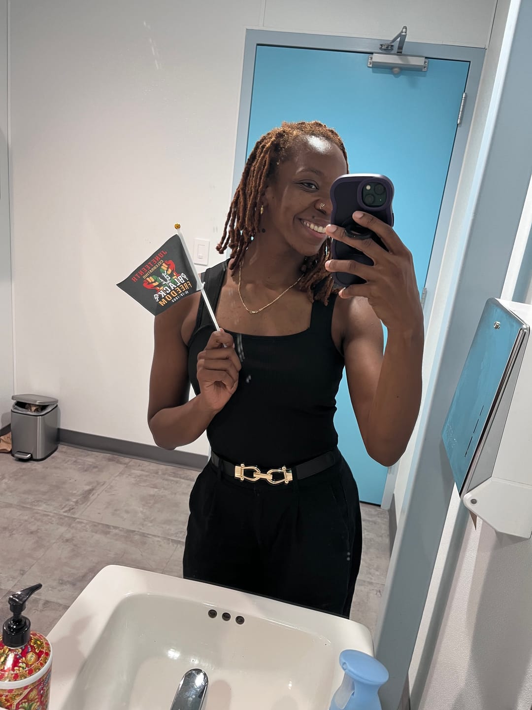 Customer photo review of Raya Twisted Hoop Earrings