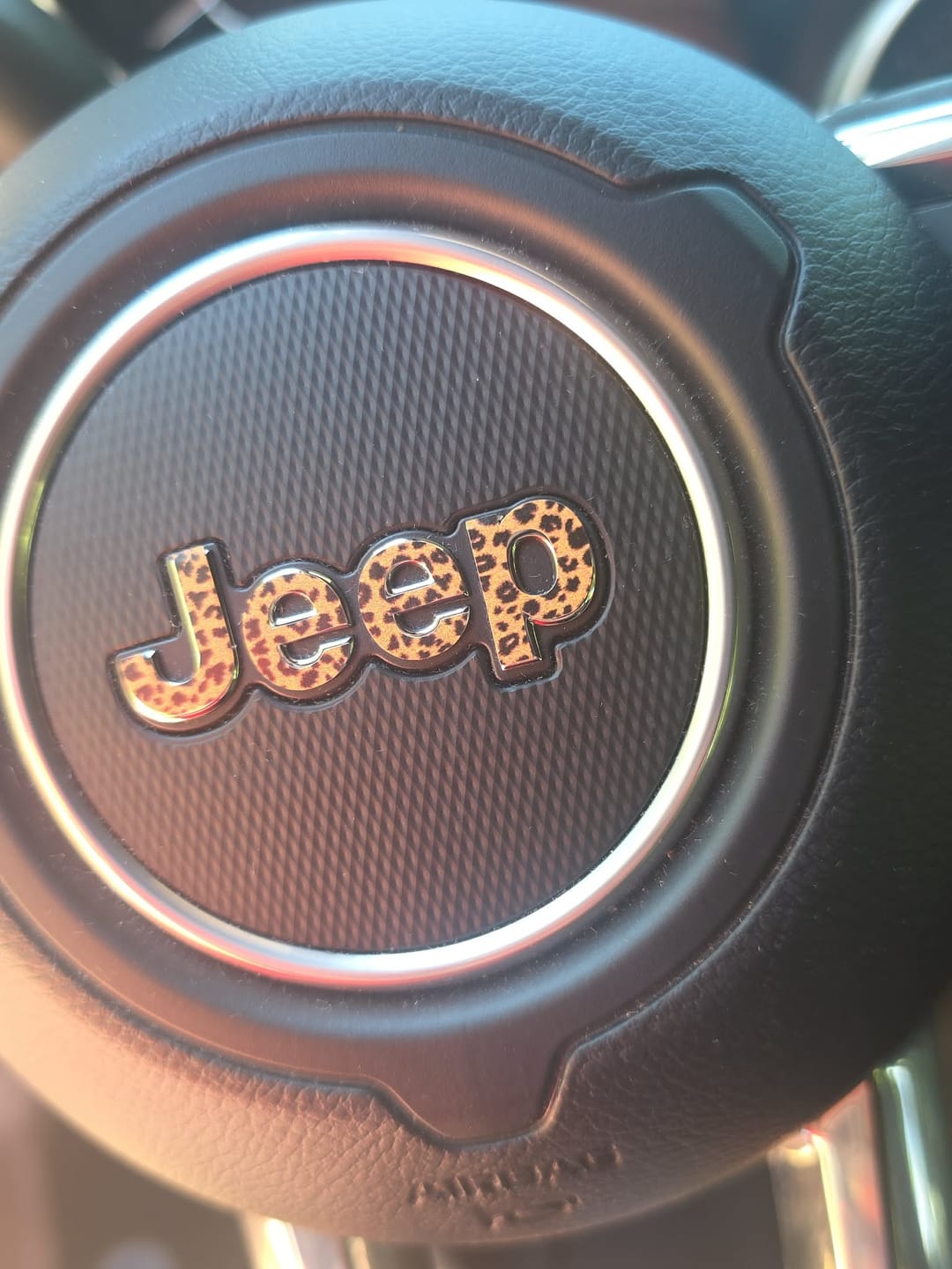 Customer photo review of JEEP Steering Wheel Emblem Overlay Decal — 30+ Colors & Designs (Flag, Topo, Animal, Solid)