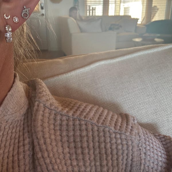 Customer photo review of Clara 4.50 CTW Moissanite 20MM Hoop Earrings