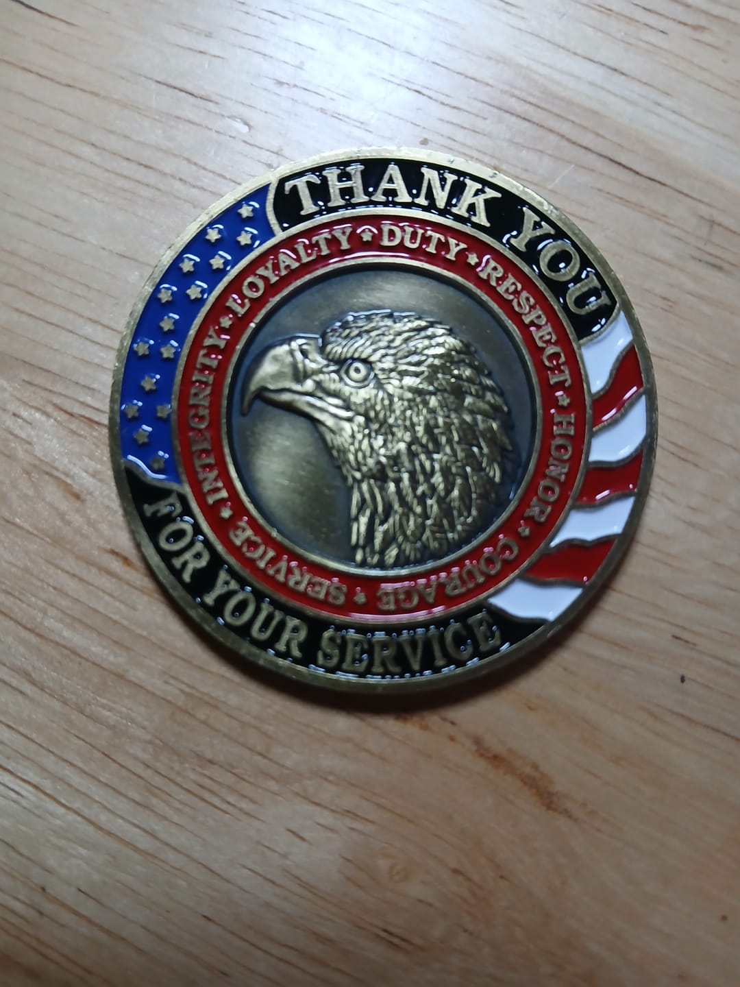 Customer photo review of Honoring All Who Served Thank You Coin