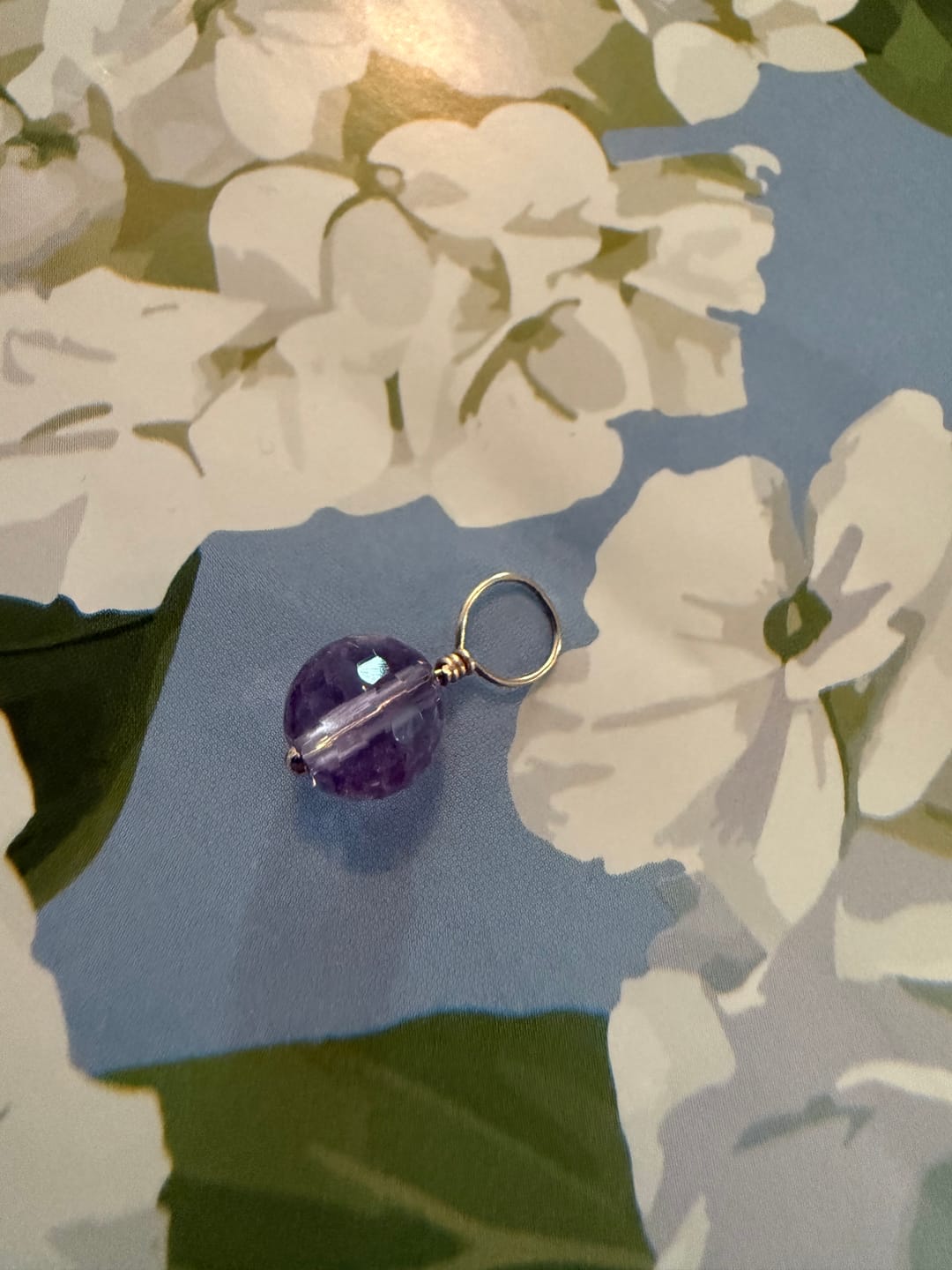 Customer photo review of Purple Amethyst Faceted Ball Gemstone