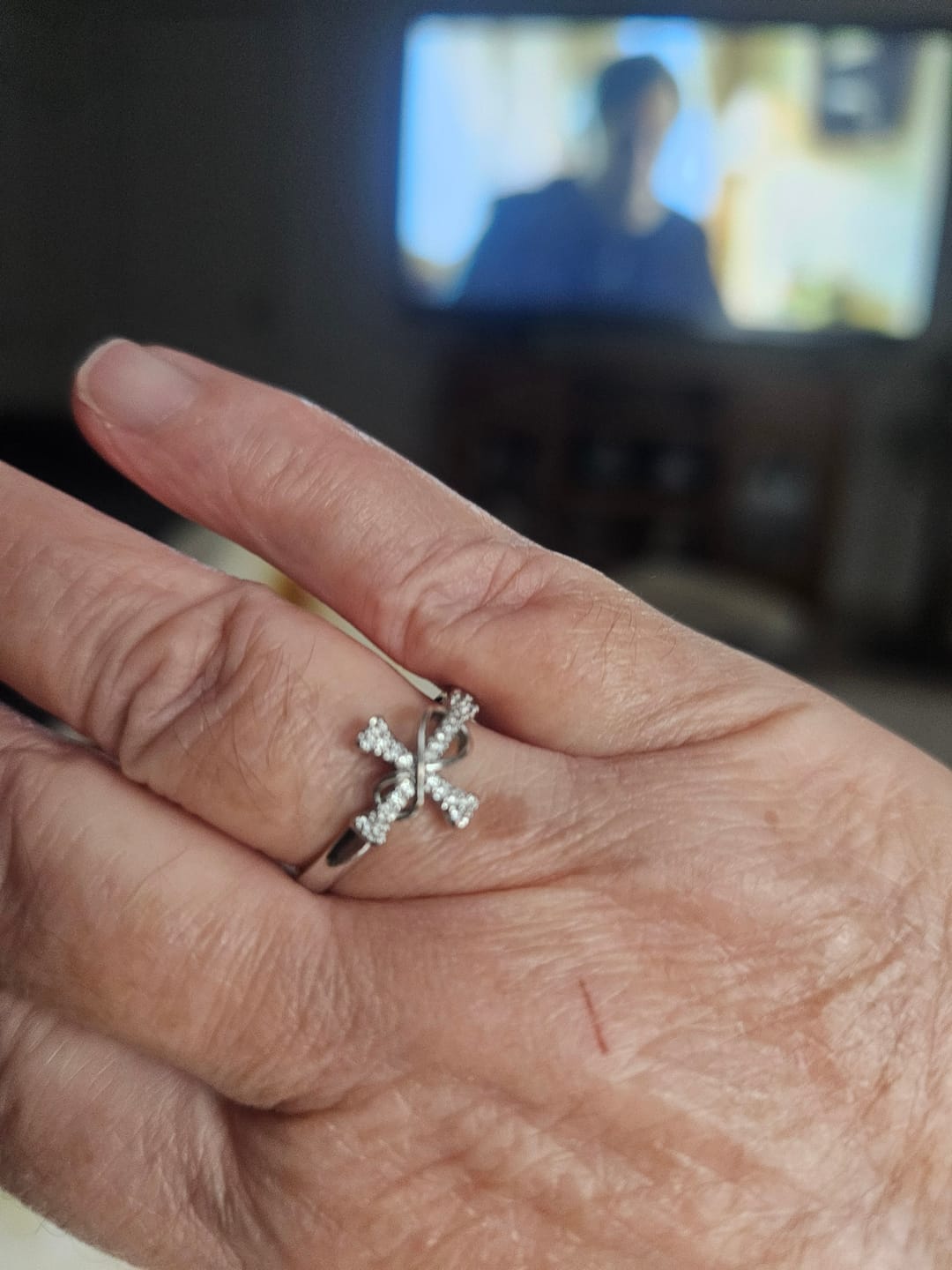 Customer photo review of Christianartworkshop Golden/Silver Mobius Cross Ring: Carry His Grace in Daily Wear