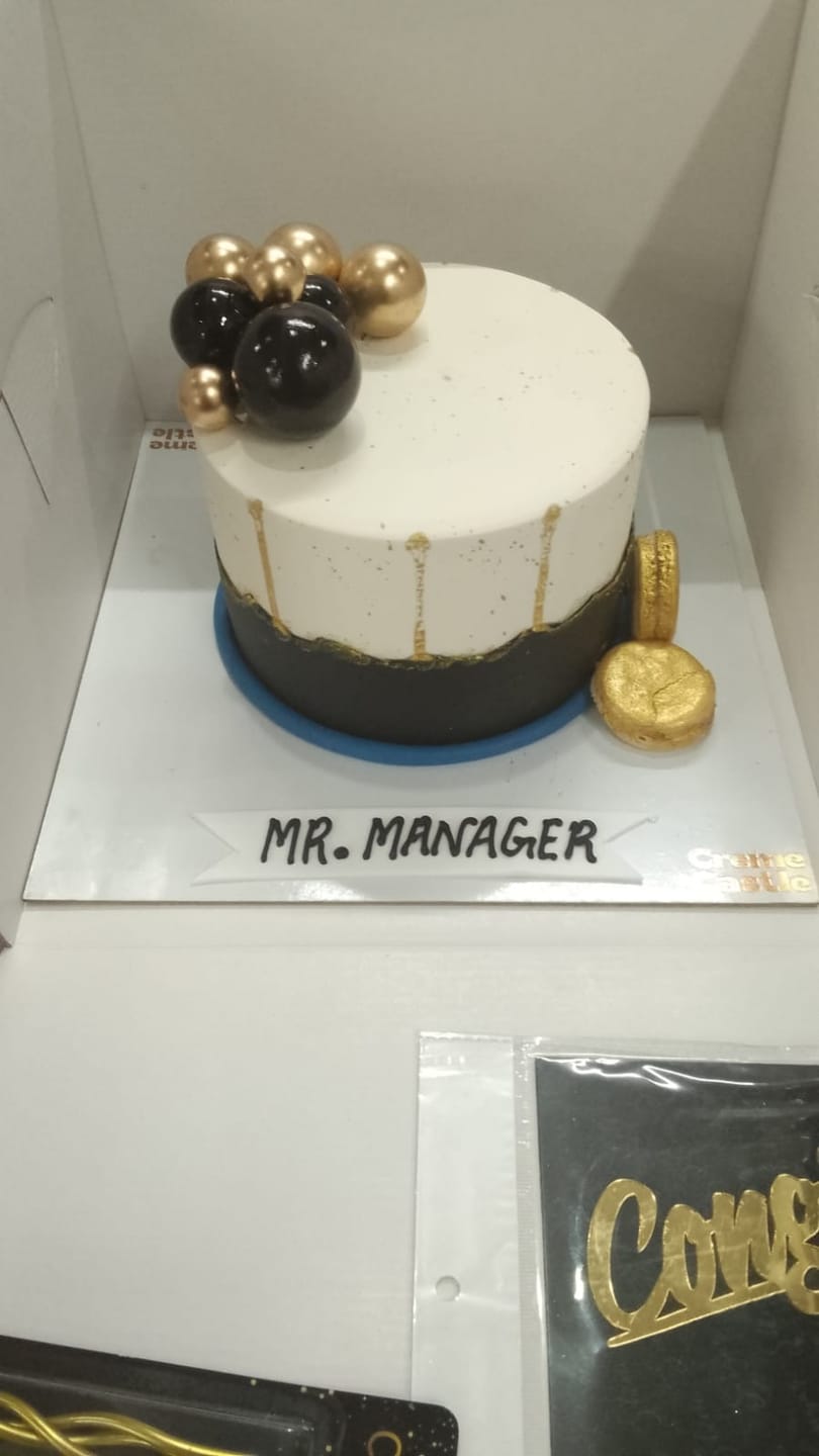 Customer photo review of Gold Splash Blue Cake