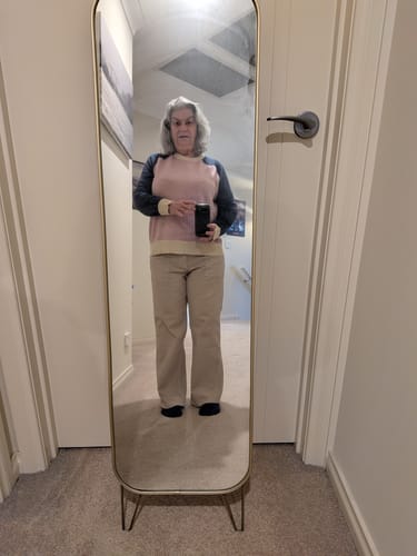 Reviewer showing the full-length, relaxed fit of the natural-colored GS Hudson Jean.