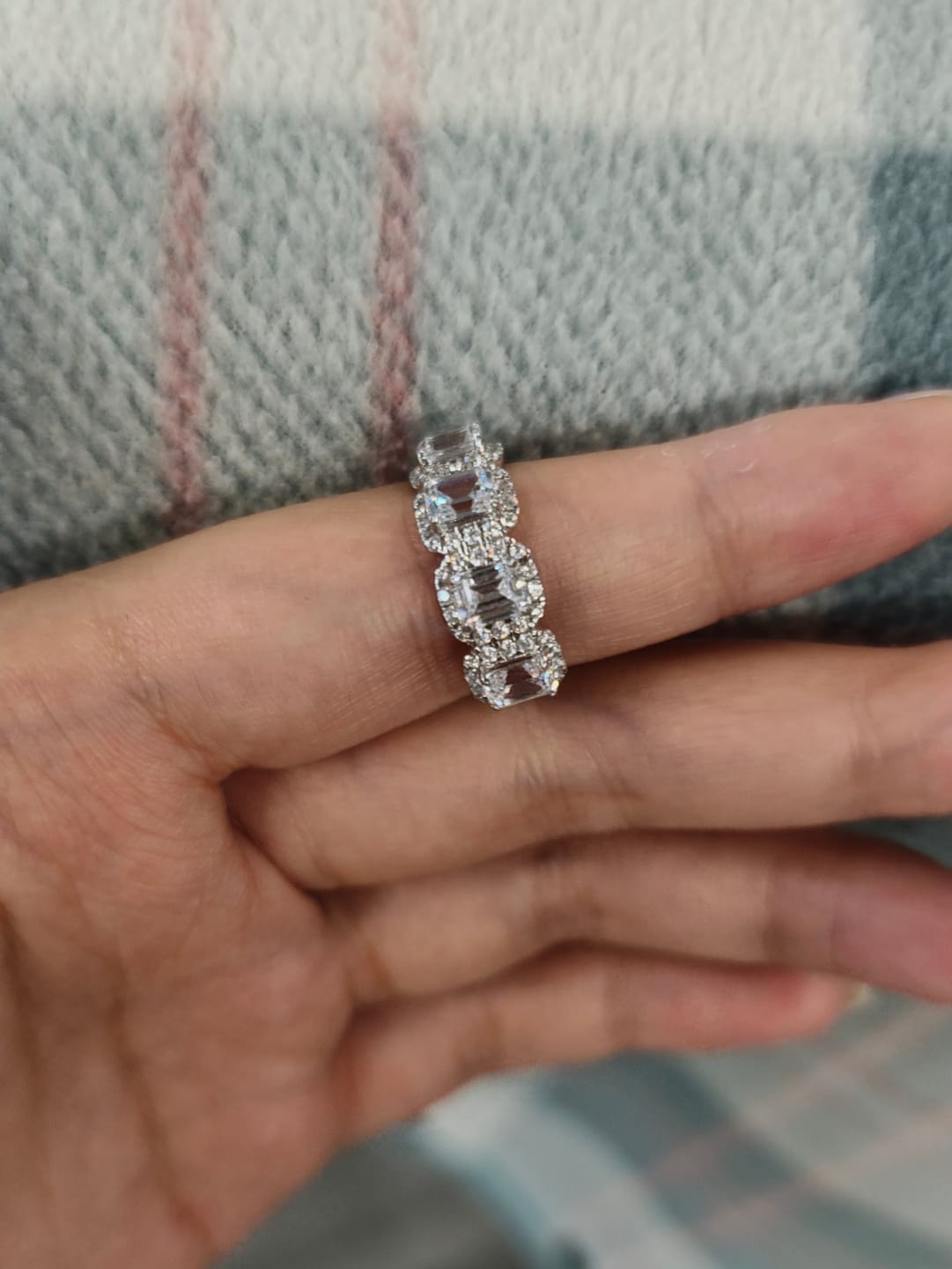 Customer photo review of 3.3Ct Halo Emerald Cut White Stone Anniversary Ring In Sterling Silver