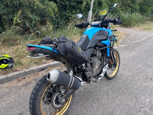 Customer's blue Yamaha Tenere T7 parked on a roadside, showing the clean rear with the installed tail tidy.