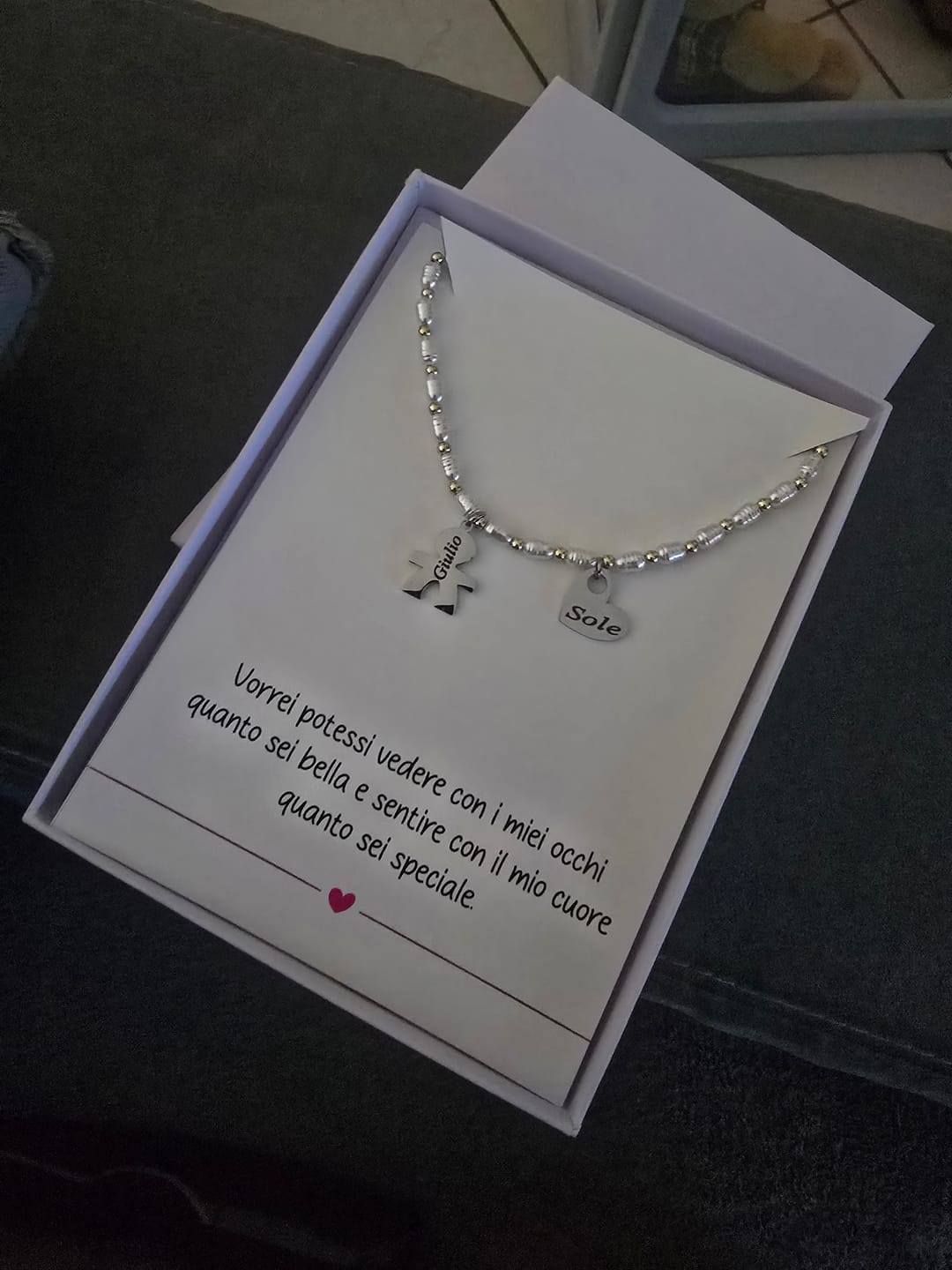 Customer photo review of Girocollo perline con bambini e incisione