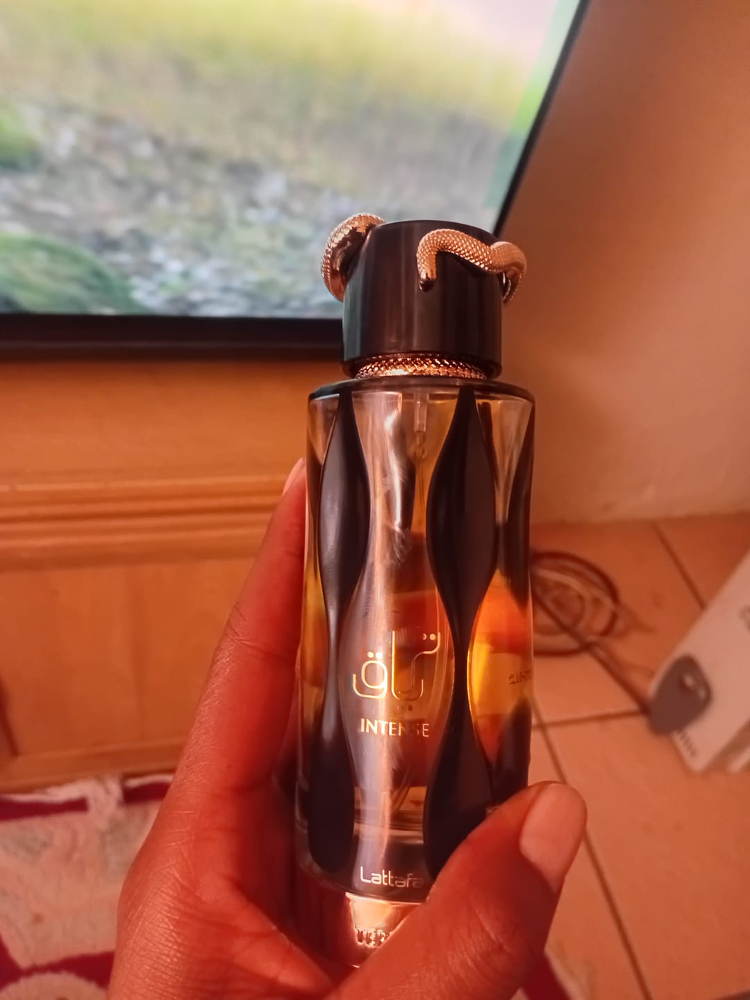 Customer photo review of Teriaq Intense Eau Parfum 100ml - Lattafa