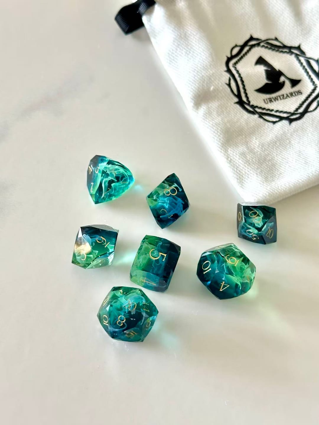 Customer photo review of URWizards D&D Resin Tidebound Fate Engraved Dice Set Multi-faceted Style