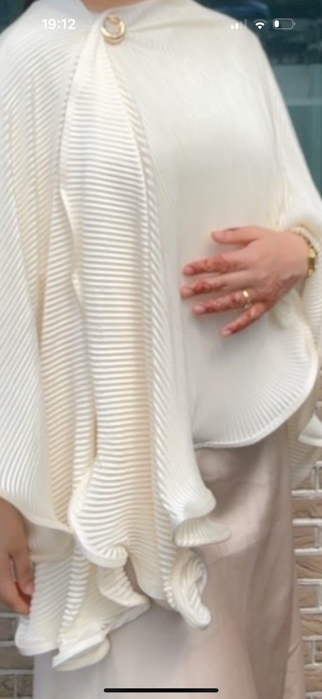 Customer photo review of Ruffle poncho - Cream